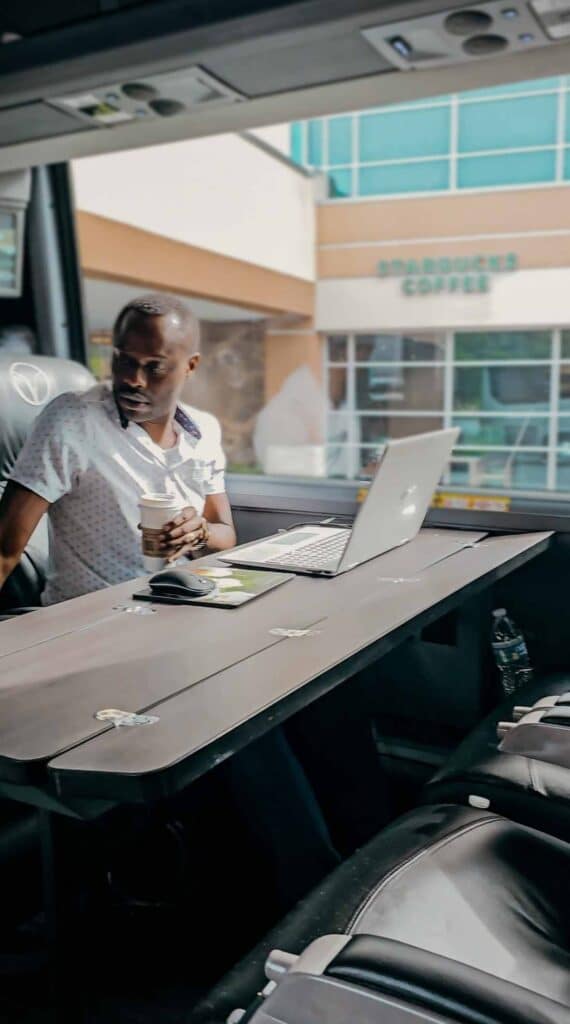 business class passenger aboard a luxury bus