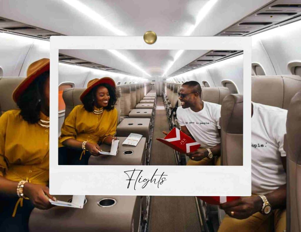 Couple reviewing travel documents while seated on an airplane cabin representing flight search and airfare planning