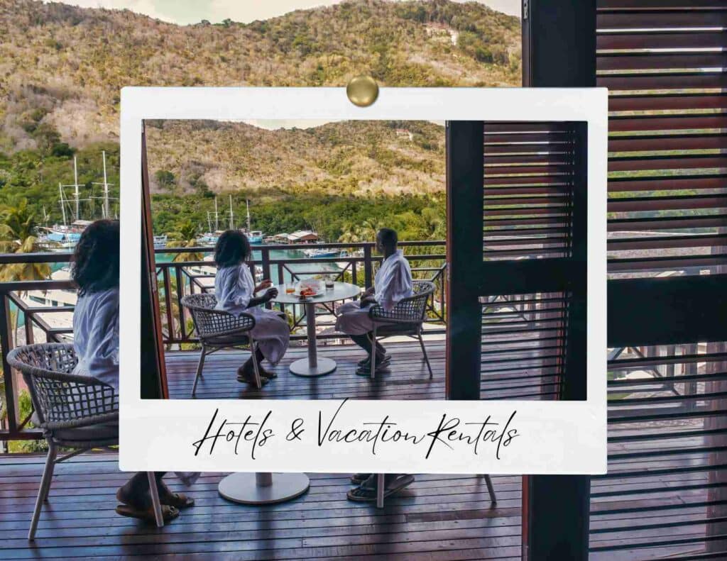 Travelers relaxing on a balcony overlooking a tropical harbor representing hotel and vacation rental booking