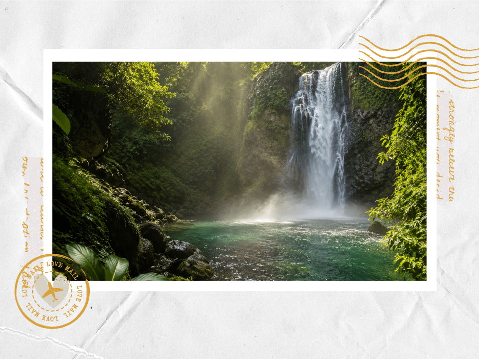Waterfall in a lush Costa Rica rainforest with a turquoise pool