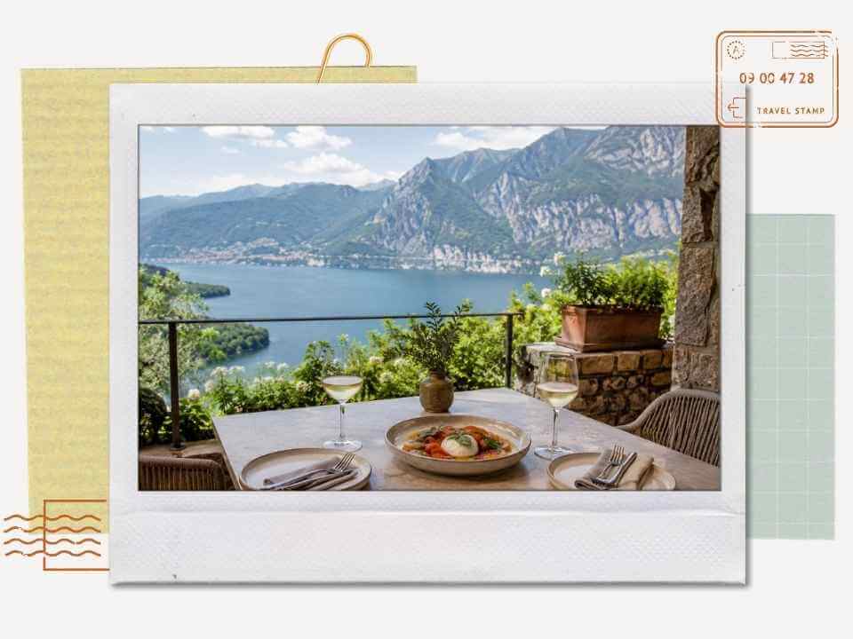 Outdoor terrace dining table overlooking a mountain lake